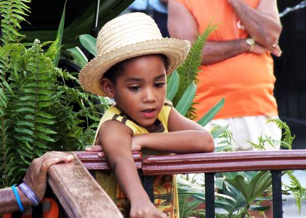 Resulta atractivo a la vista ver a los m�s peque�os usando sombreros. Foto Abel Rojas  