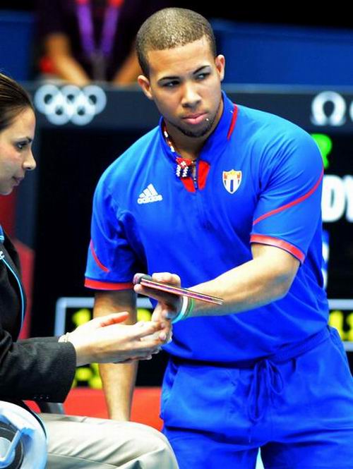 Andy Pereyra, primer cubano que gana un juego en Tenis de Mesa en citas olímpicas; en los XXX Juegos Olímpicos de Londres 2012, en Excel Centre de Inglaterra, el 28 de julio de 2012. Foto: Marcelino Vázquez Hernández. Andy Pereyra, primer cubano que gana un juego en Tenis de Mesa en citas olímpicas; en los XXX Juegos Olímpicos de Londres 2012, en Excel Centre de Inglaterra, el 28 de julio de 2012. Foto: Marcelino Vázquez Hernández.