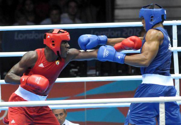 Pierde el boxeador cubano Erislandy Savón (I) ante el británico Joshua Anthony, en la división de más de 91 kilogramos, en los XXX Juegos Olímpicos de Londres; en combate efectuado en el ExCel Centre Arena 2 Sur, en Inglaterra, el 1 de agosto de 2012. Foto: Marcelino Vázquez Hernández. Pierde el boxeador cubano Erislandy Savón (I) ante el británico Joshua Anthony, en la división de más de 91 kilogramos, en los XXX Juegos Olímpicos de Londres; en combate efectuado en el ExCel Centre Arena 2 Sur, en Inglaterra, el 1 de agosto de 2012. Foto: Marcelino Vázquez Hernández.