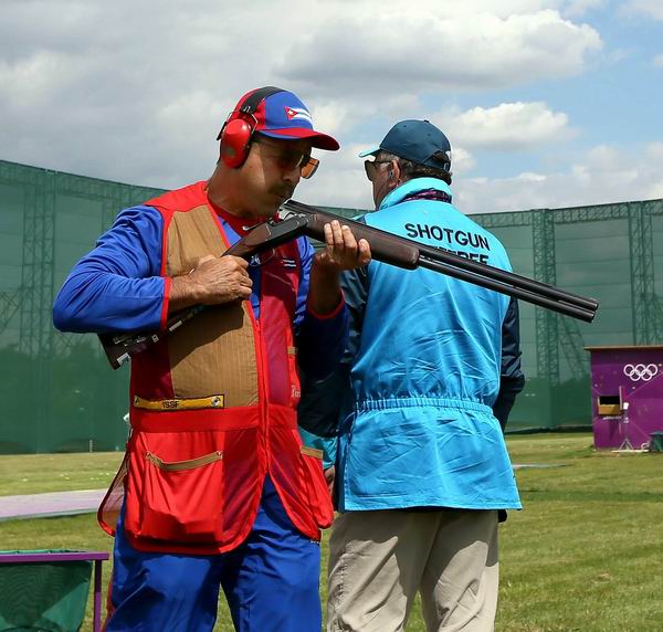 El cubano Guillermo Alfredo Torres, de Tiro deportivo, ocupó el lugar 31 del torneo de skeet en los Juegos Olímpicos de Londres 2012. Royal Artillery Barracas, Inglaterra, el 30 de julio de 2012. Foto: Marwan Naamani / AFP El cubano Guillermo Alfredo Torres, de Tiro deportivo, ocupó el lugar 31 del torneo de skeet en los Juegos Olímpicos de Londres 2012. Royal Artillery Barracas, Inglaterra, el 30 de julio de 2012. Foto: Marwan Naamani / AFP