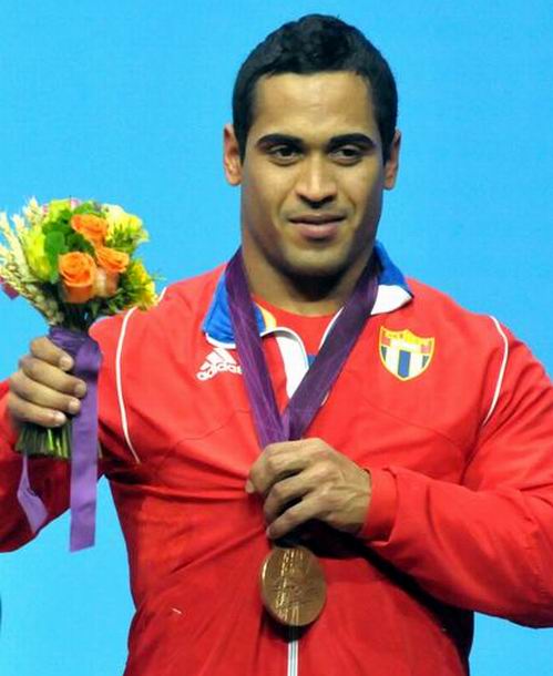 Ivn Cambar, medalla de Bronce en la divisin de los 77 kilogramos del levantamiento de pesas, en los XXX Juegos Olmpicos de Londres 2012, en el Centro de Convenciones ExCel, en Inglaterra, el 1 de agosto de 2012. Foto: Marcelino Vzquez Hernndez. Ivn Cambar, medalla de Bronce en la divisin de los 77 kilogramos del levantamiento de pesas, en los XXX Juegos Olmpicos de Londres 2012, en el Centro de Convenciones ExCel, en Inglaterra, el 1 de agosto de 2012. Foto: Marcelino Vzquez Hernndez.