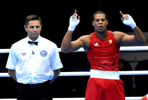 El boxeador cubano José Ángel Larduet, división 91 Kg, cayó en dudoso veredicto en cuartos de final ante el italiano Clemente Russo, en los XXX Juegos Olímpicos de Londres 2012, en el ExCel Center Arena 2 Sur, Inglaterra, el 5 de agosto de 2012. Foto: Marcelino Vázquez Hernández. El boxeador cubano José Ángel Larduet, división 91 Kg, cayó en dudoso veredicto en cuartos de final ante el italiano Clemente Russo, en los XXX Juegos Olímpicos de Londres 2012, en el ExCel Center Arena 2 Sur, Inglaterra, el 5 de agosto de 2012. Foto: Marcelino Vázquez Hernández.