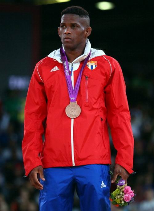 Livn Lpez gan medalla de bronce en la divisin de los 66 kg. en el torneo de lucha libre de los XXX Juegos Olmpicos Londres 2012. Foto: Ryan Pierse. Livn Lpez gan medalla de bronce en la divisin de los 66 kg. en el torneo de lucha libre de los XXX Juegos Olmpicos Londres 2012. Foto: Ryan Pierse.