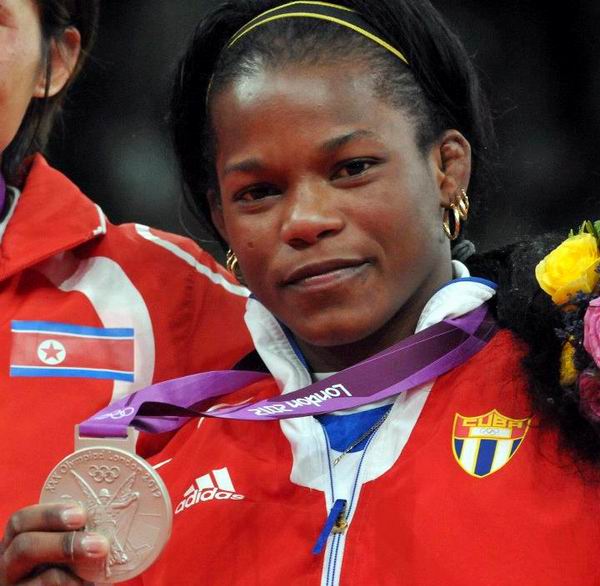 La judoca cubana Yanet Bermoy dio a Cuba este domingo su primera medalla en los Juegos Olmpicos de Londres tras caer en la final de los 52 kilogramos por punto de oro frente a Am Kum Ae, de Corea del Norte. Foto: Ricardo Lpez Hevia La judoca cubana Yanet Bermoy dio a Cuba este domingo su primera medalla en los Juegos Olmpicos de Londres tras caer en la final de los 52 kilogramos por punto de oro frente a Am Kum Ae, de Corea del Norte. Foto: Ricardo Lpez Hevia