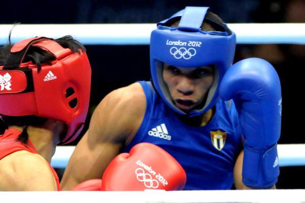 El joven boxeador cubano Yosvany Veitía, división 49 kg., perdió en su primer combate ante el experimentado púgil chino Zou Shiming, en los XXX Juegos Olímpicos de Londres 2012, ExCel Center Arena 2 Sur, Inglaterra, el 4 de agosto de 2012. Foto: Marcelino Vázquez Hernández. El joven boxeador cubano Yosvany Veitía, división 49 kg., perdió en su primer combate ante el experimentado púgil chino Zou Shiming, en los XXX Juegos Olímpicos de Londres 2012, ExCel Center Arena 2 Sur, Inglaterra, el 4 de agosto de 2012. Foto: Marcelino Vázquez Hernández.