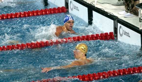 El cubano Hanser García (gorro azul) conquistó hoy una sorpresiva medalla de plata en los 100 metros libres de los XVI Juegos Panamericanos Guadalajara-2011. Foto: Ismael Francisco