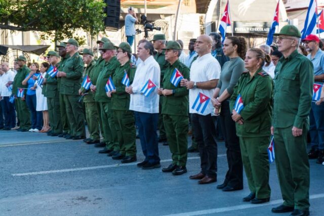 Acto por el Aniversario 65 de la proclamación del carácter socialista de la Revolución Cubana