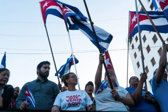 Acto por el Aniversario 65 de la proclamación del carácter socialista de la Revolución Cubana