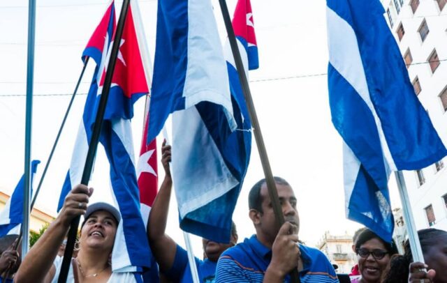 Acto por el Aniversario 65 de la proclamación del carácter socialista de la Revolución Cubana